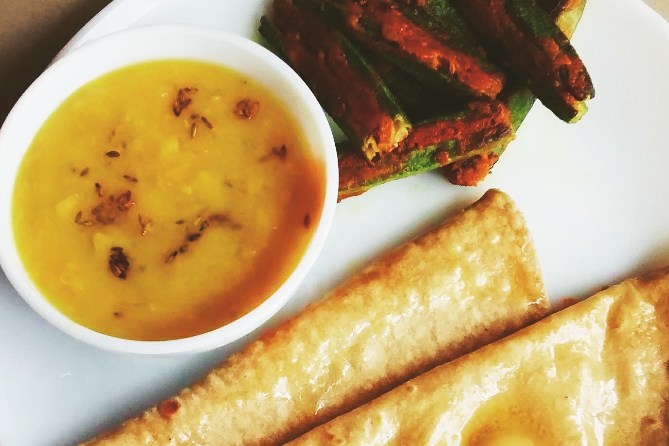Homestyle roti with yellow dal and stuffed bhindi